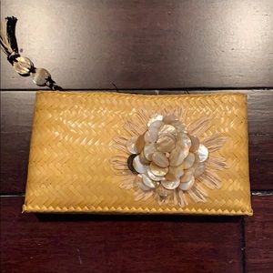 Adrienne vittadini straw clutch.